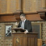 Headmaster Tim O'Connor at the lectern