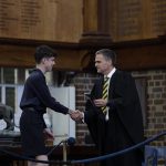 Form 6 student Sam Fisher receives Colours for Rowing