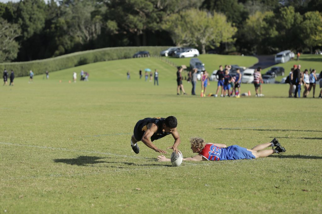 Boston Krone crosses the line for a try in the team's game against Rosmini College